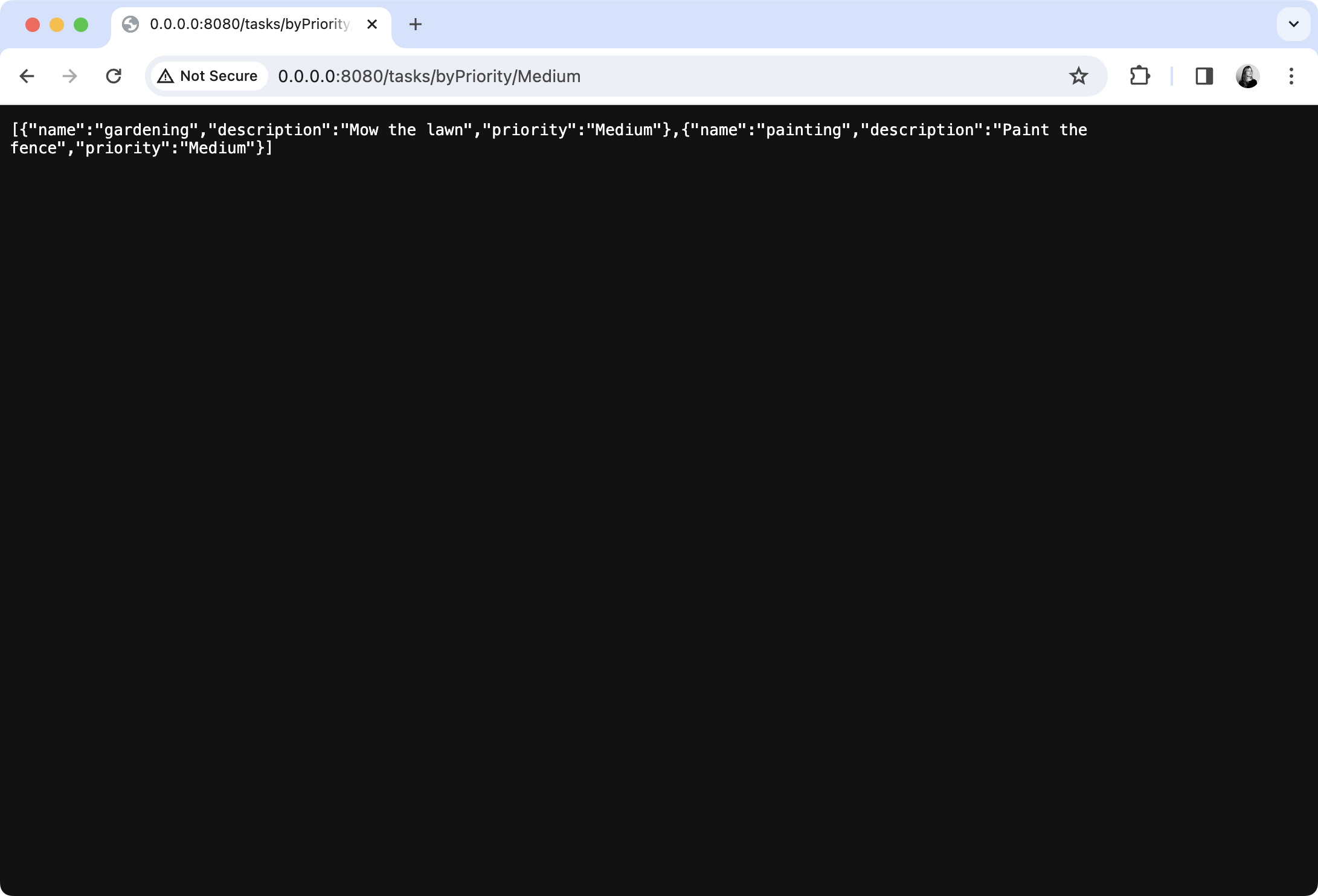 A browser window showing tasks with medium priority in JSON format